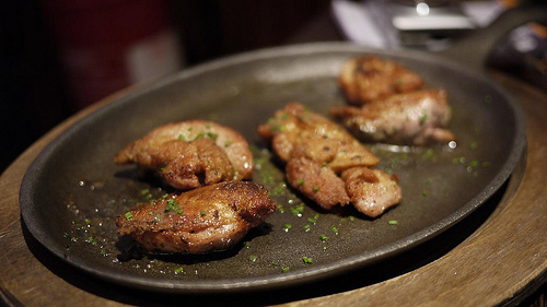 Grilled quail breasts at Dans les Landes by Sophie Brissaud