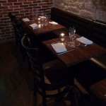 Empty tables taunting you at Frenchie. Photo by Meg Zimbeck.