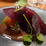 Shaved beet atop crab, heirloom tomatoes and miso vinaigrette