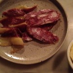 House-made charcuterie, including smoked and cured duck breast and pork saussicon at Bones restaurant