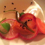 Amuse bouche of moked eel with carrots, radish and sea urchin at Bones restaurant