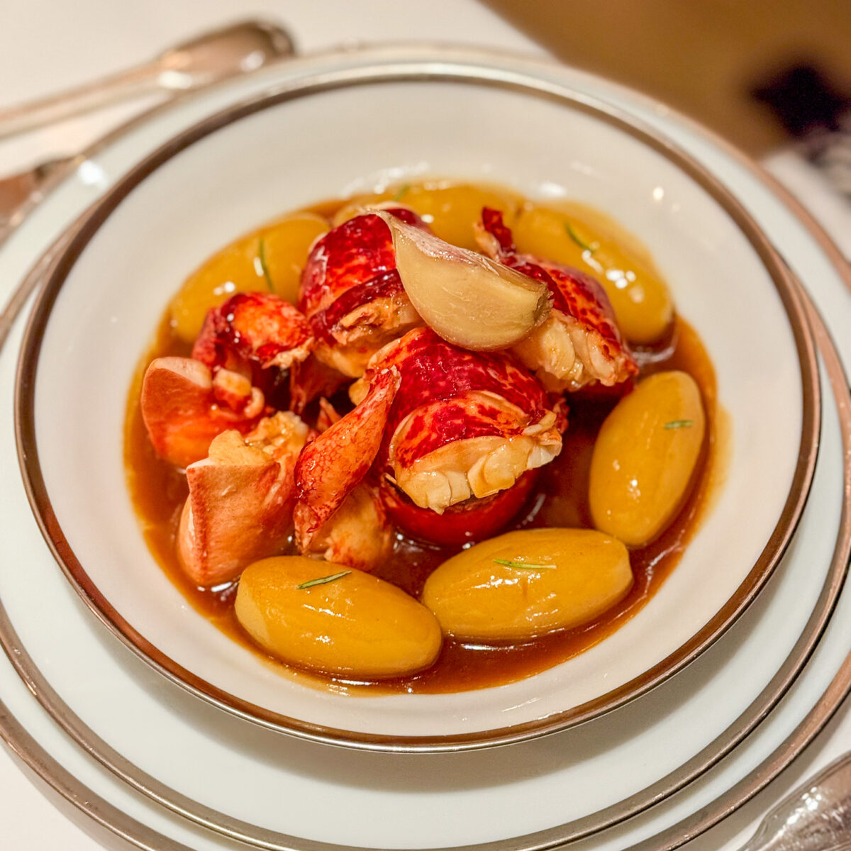 Lobster with rosemary and potatoes at L'Ambroisie | PARIS BY MOUTH Lobster with rosemary and potatoes at L'Ambroisie restaurant in Paris