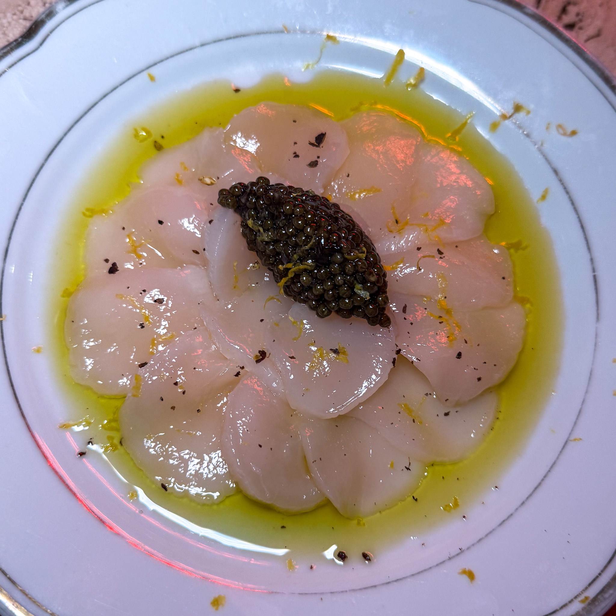 Scallops with caviar at Augustin Marchand d'Vins wine bar in Saint-Germain, Paris