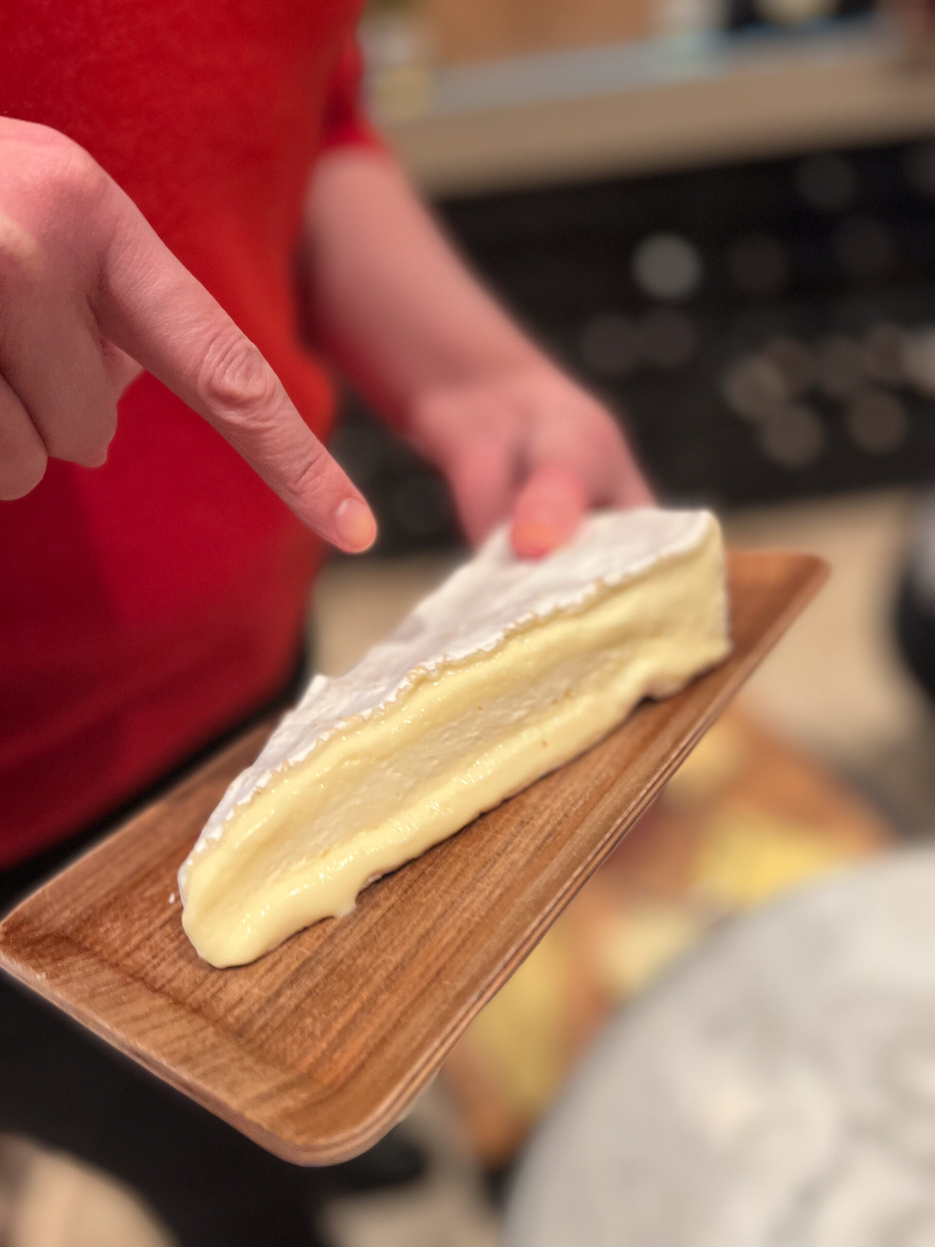 Tasting authentic French Brie on the Paris by Mouth South Marais food tour, Paris