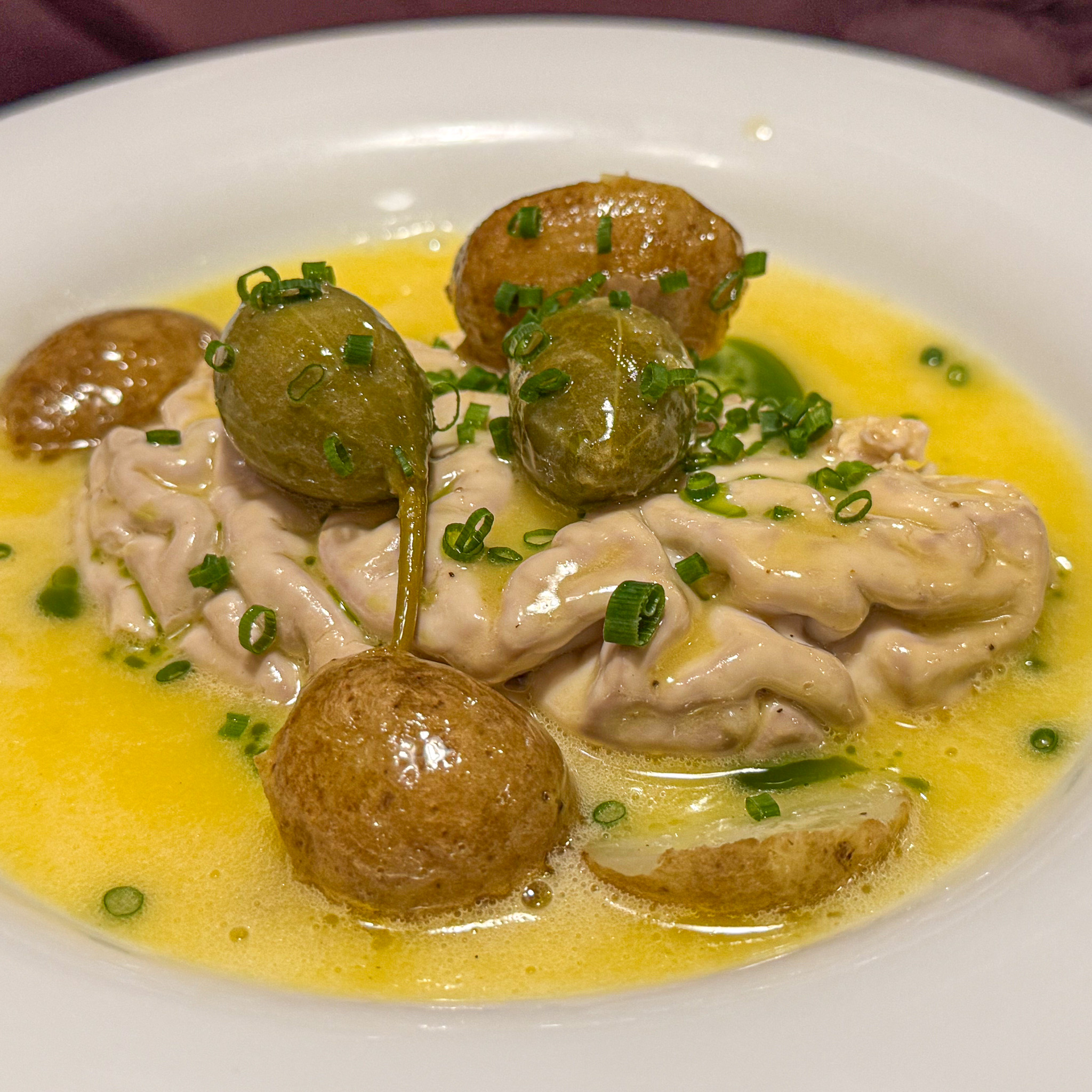 Poached veal brain in lemon butter with potatoes and caperberries, Quedubon, 19th arrondissement, Paris