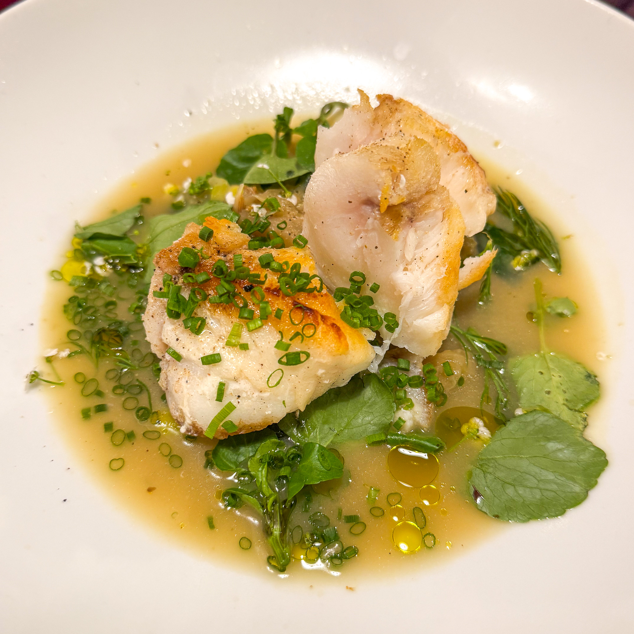 Monkfish tail in bourrida broth with wild garlic, Quedubon, 19th arrondissement, Paris