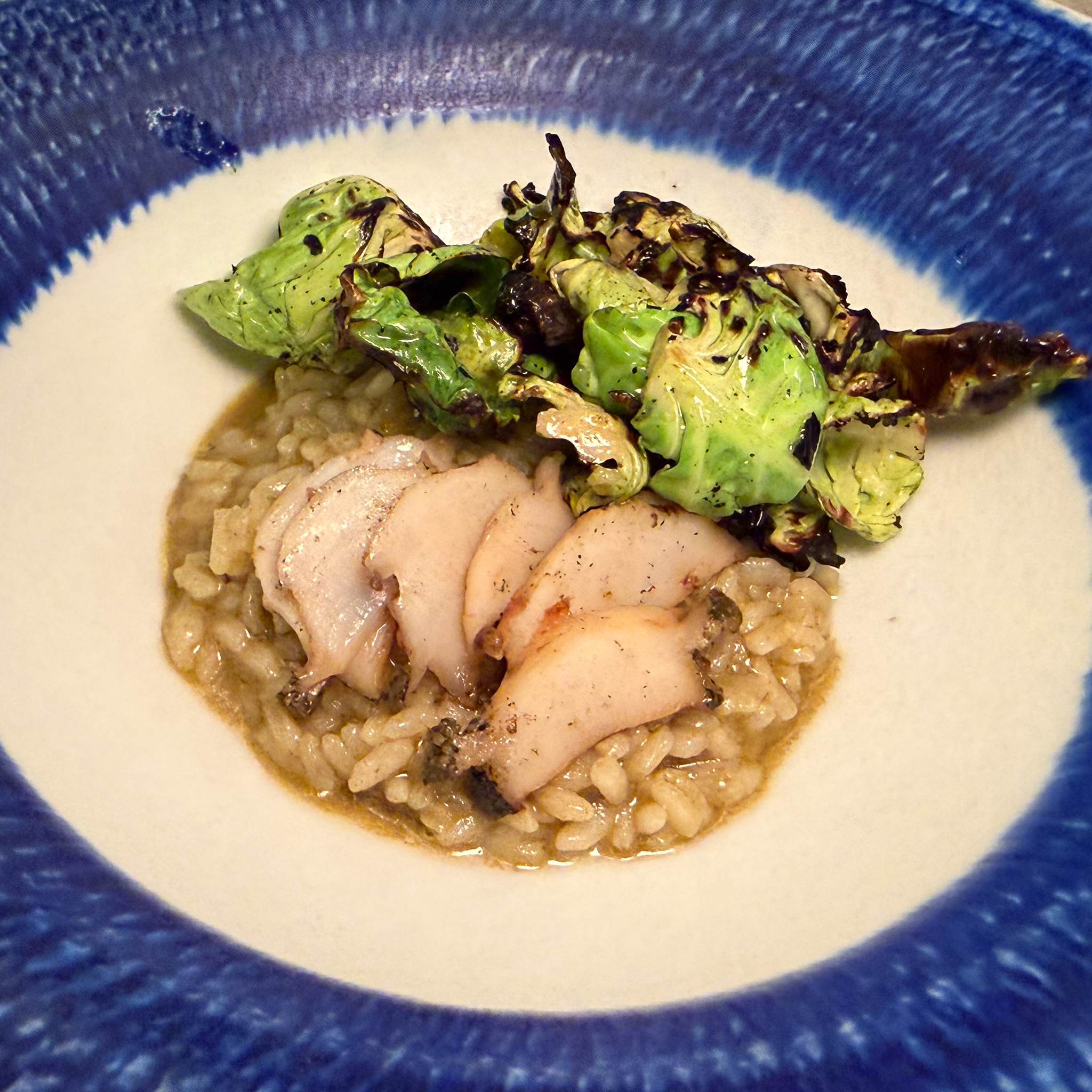 Abalone with Camargue rice and charred Brussels sprouts at Cypsèle, Île Saint-Louis