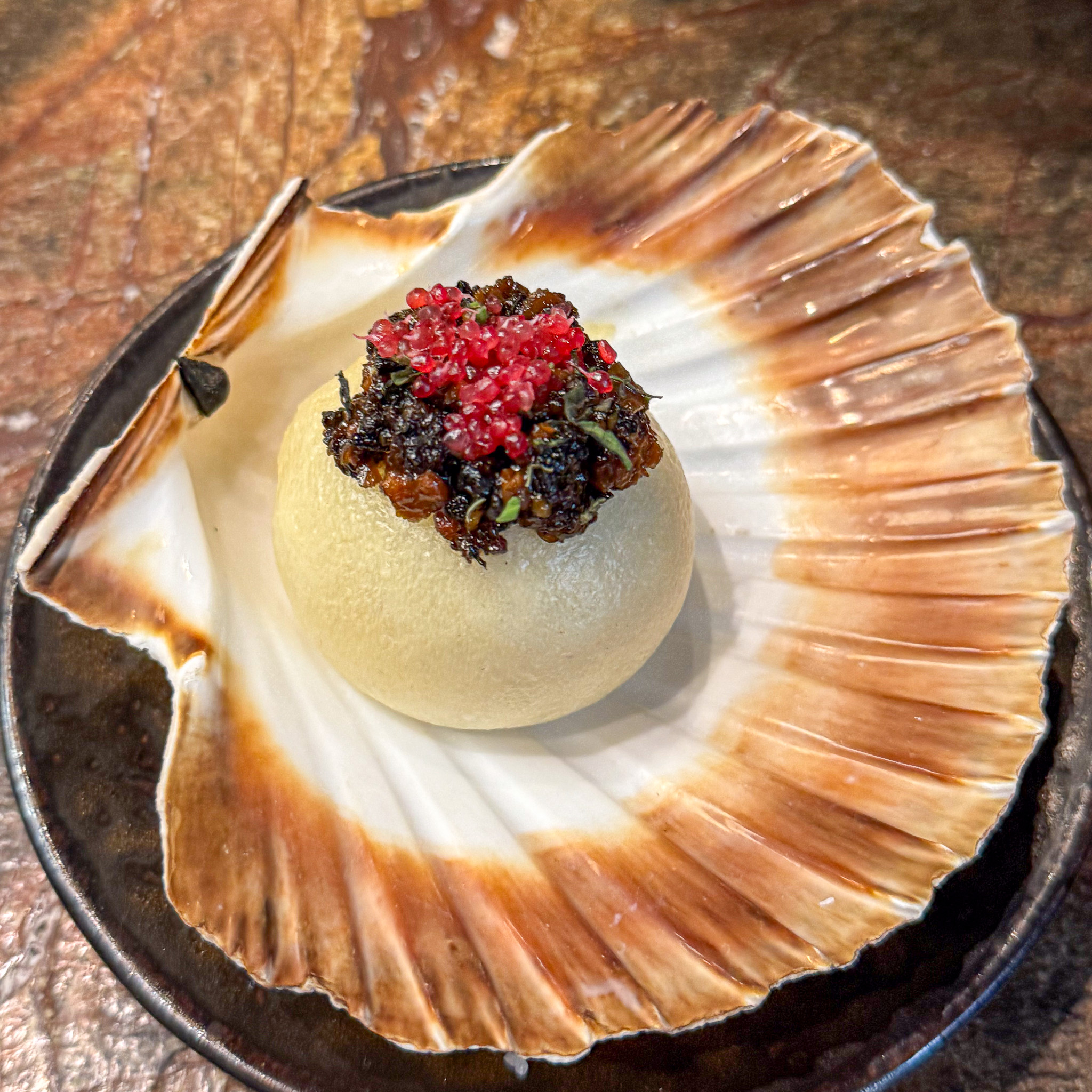 Scallop in the shell with craterellus mushrooms at Substance, 16th arrondissement, Paris