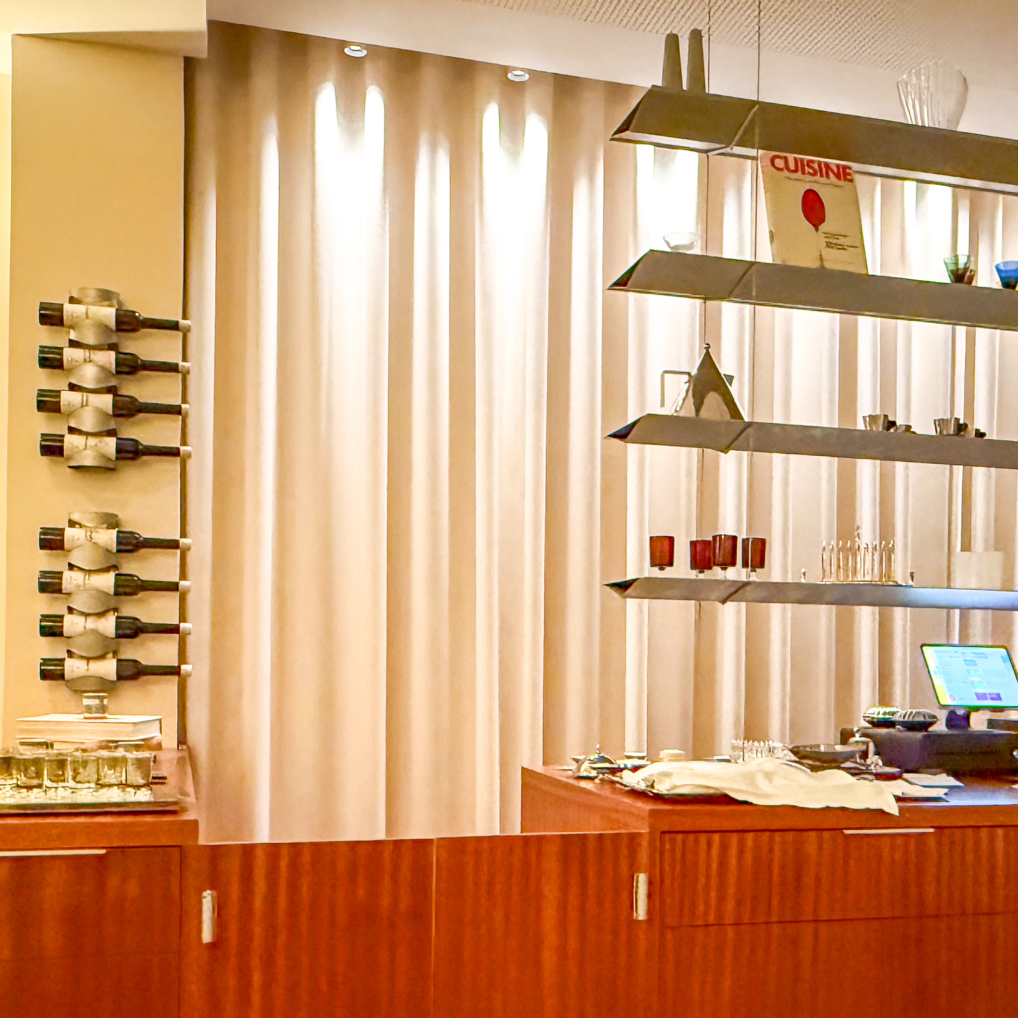 service-station-shelving-glassware-occasion-paris | PARIS BY MOUTH Wall-mounted wine rack and mid-century sconce at Occasion, Paris 10th