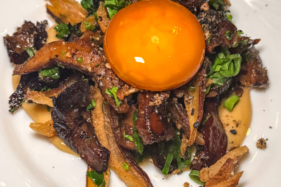 Hazaya — charcoal mushrooms with soy-cured egg yolk and garlic cream at Zoutra, Paris 18th