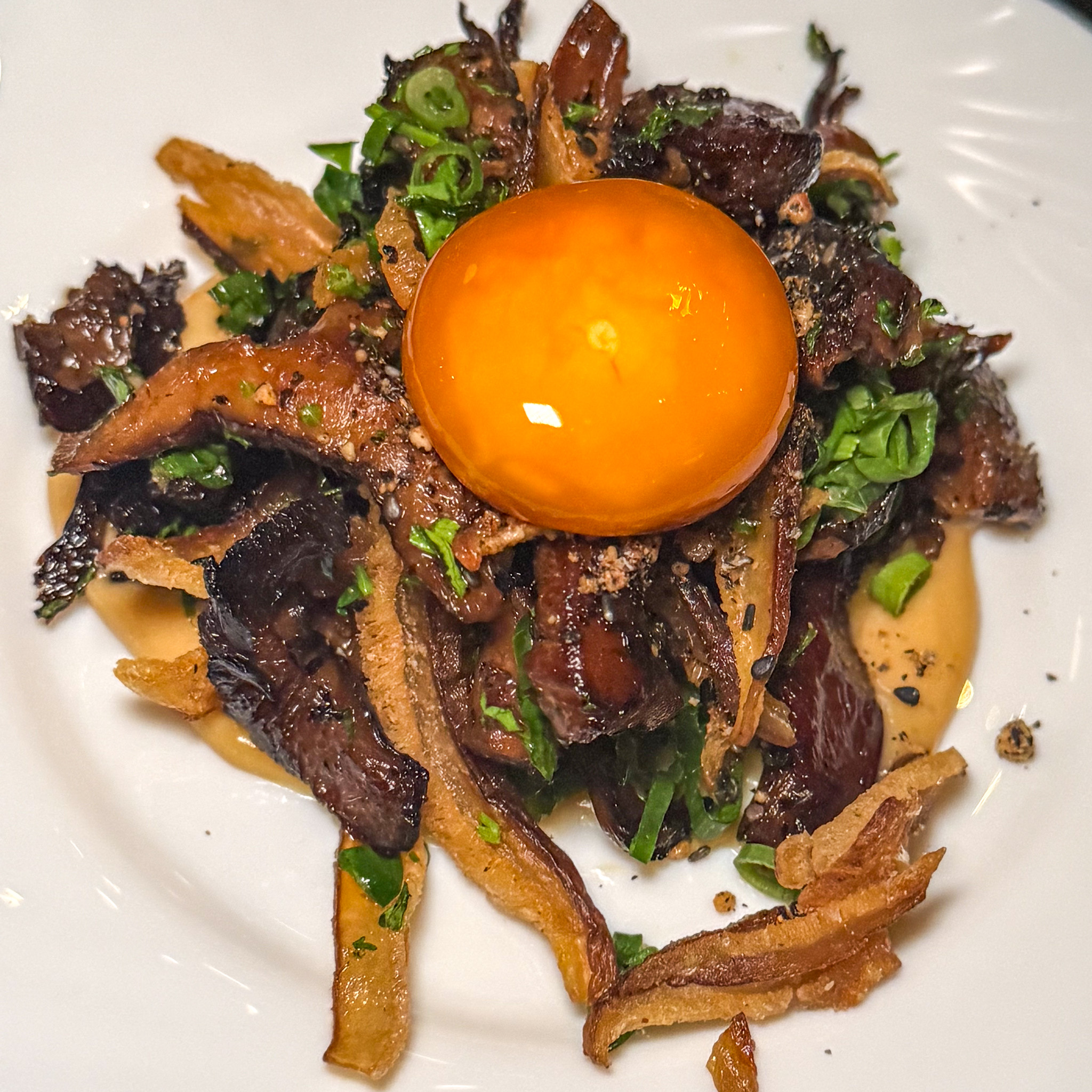 Hazaya mushrooms with egg yolk at Zoutra, Paris 18th arrondissement