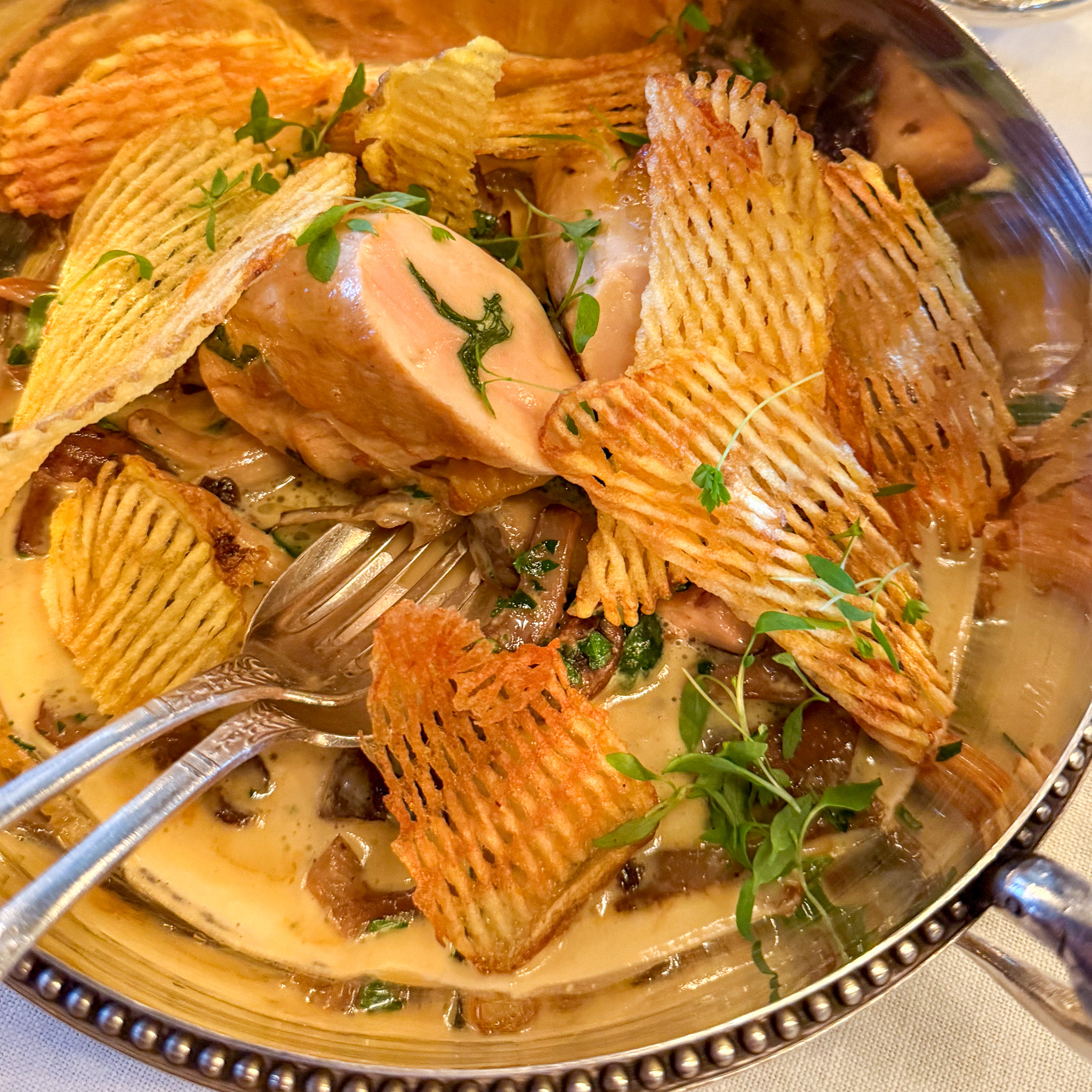 volaille-gaufrettes-le-grand-vefour-restaurant-paris | PARIS BY MOUTH Volaille with creamy mushrooms and house-made pommes gaufrettes at Le Grand Véfour.